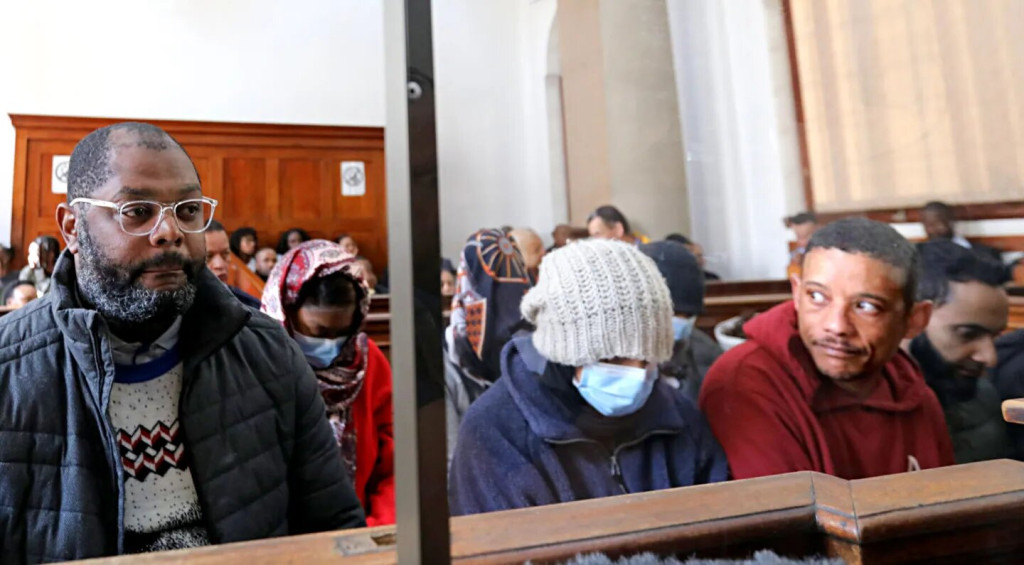 Malusi Booi, Suraya Manuel, Abdul-Kader Davids, Muhammadh Amod and six other co-accused appeared at the Cape Town Magistrates’ Court on 11 September 2024. (Photo: Shelley Christians)