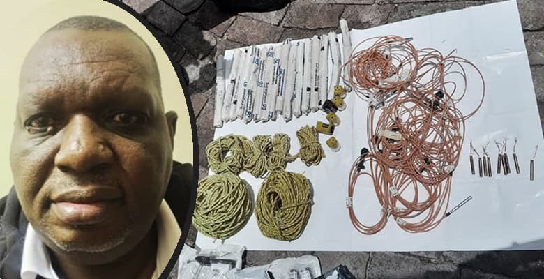 Disgraced former Komatipoort policeman, alleged rhino poaching kingpin and murder accused Joseph Nyalungu was once again arrested in Hazyview this afternoon, October 15. This time, the man colloquially known as ‘Big Joe’ was caught with explosives commonly used in the commission of cash-in-transit heists. The operation in which the SAPS’s elite National Intervention Unit pounced on Nyalungu’s workshop follows a meticulous investigation by the Hawks. ALSO READ: Big Joe and his wife appear in the Nelspruit Magistrate’s Court It is understood Nyalungu was found in possession of two sticks of dynamite, two detonators, two chords and three rounds of 458 ammunition. Nyalungu will spend the night behind bars before appearing in the Calcutta Magistrate’s Court tomorrow morning. He is no stranger to the inside of a courtroom as he currently faces a raft of charges in a series of court cases relating to rhino poaching, murder, racketeering, theft, tax evasion, money laundering, corruption and other charges.