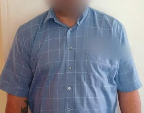 Ex-principal appears in court, faces child pornography and grooming charges