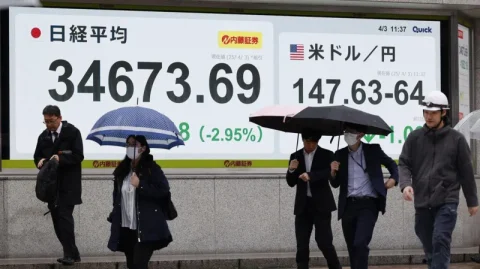 Global stocks slide as Trump tariffs hit markets